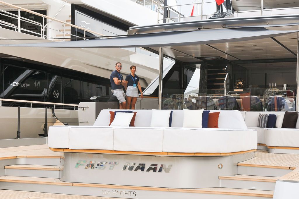 Yachts and crew on the docks at the 2026 Monaco Yacht Show in Port Hercule, Monaco.