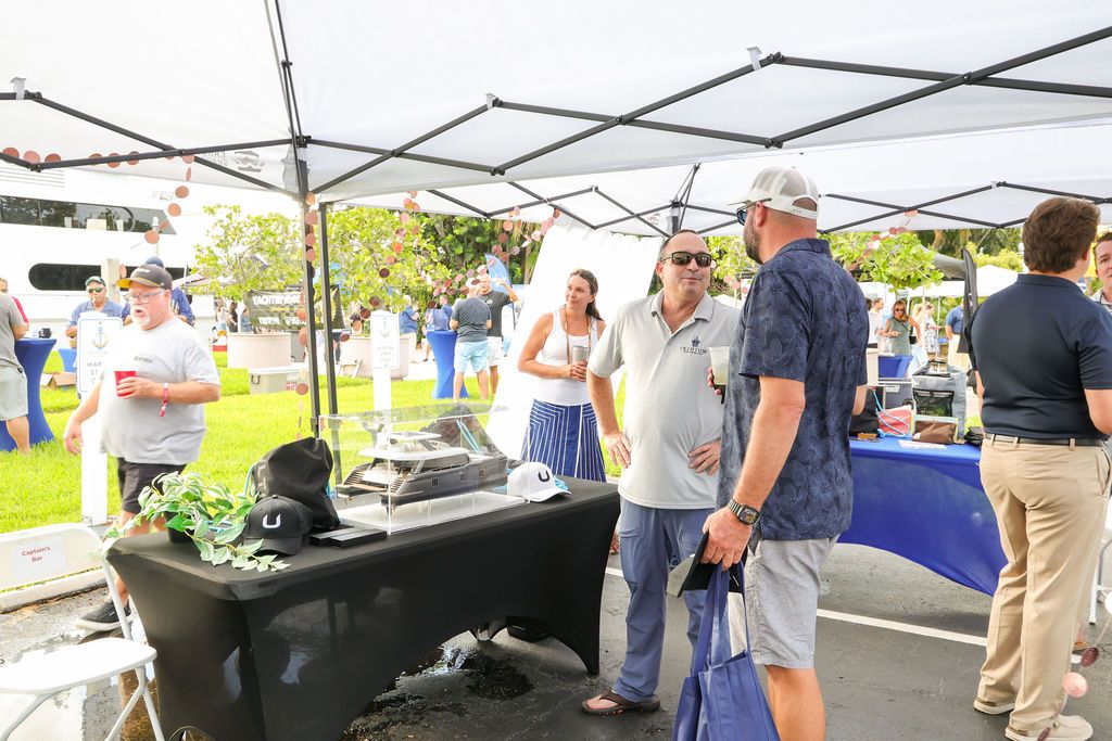 Guests and exhibitors at The Triton's Fall Triton Expo at Bahia Mar Yachting Center.