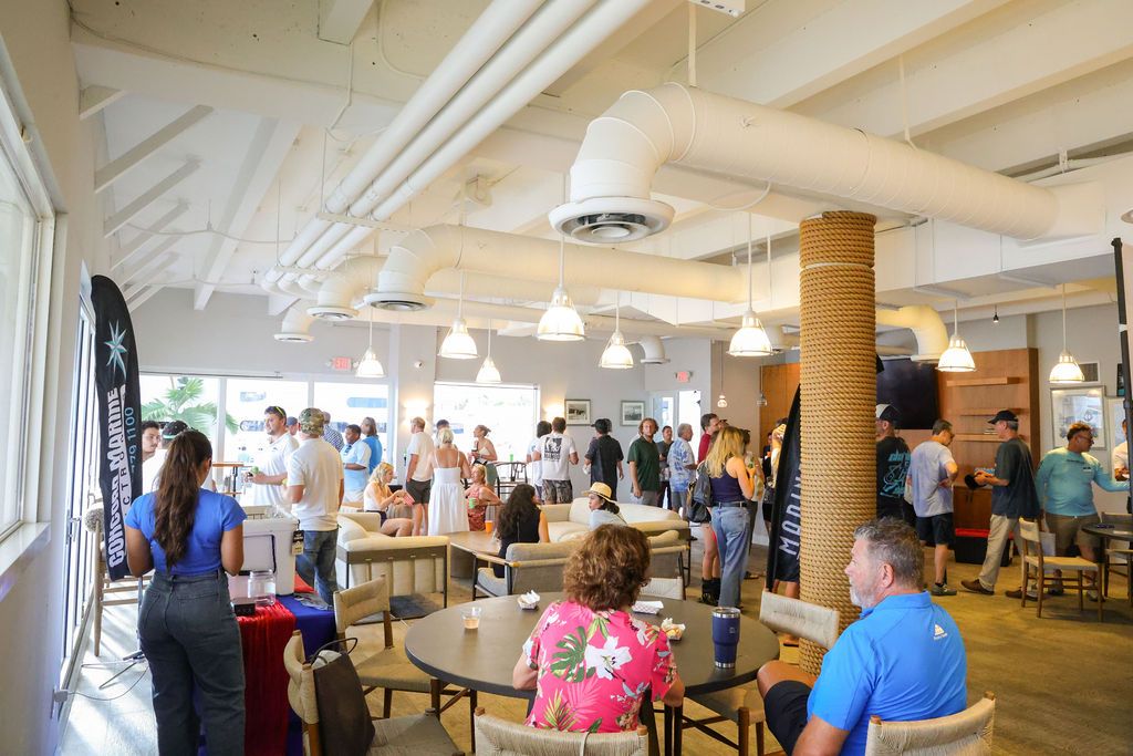 Guests and exhibitors at The Triton's Fall Triton Expo at Bahia Mar Yachting Center.