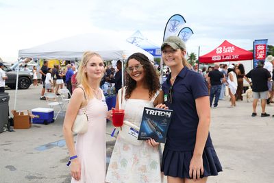 Guests networking at The Triton's Crew, Captains & Connections event at Nautical Ventures Marina.