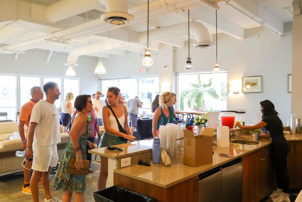 Guests and exhibitors at The Triton's Fall Triton Expo at Bahia Mar Yachting Center.