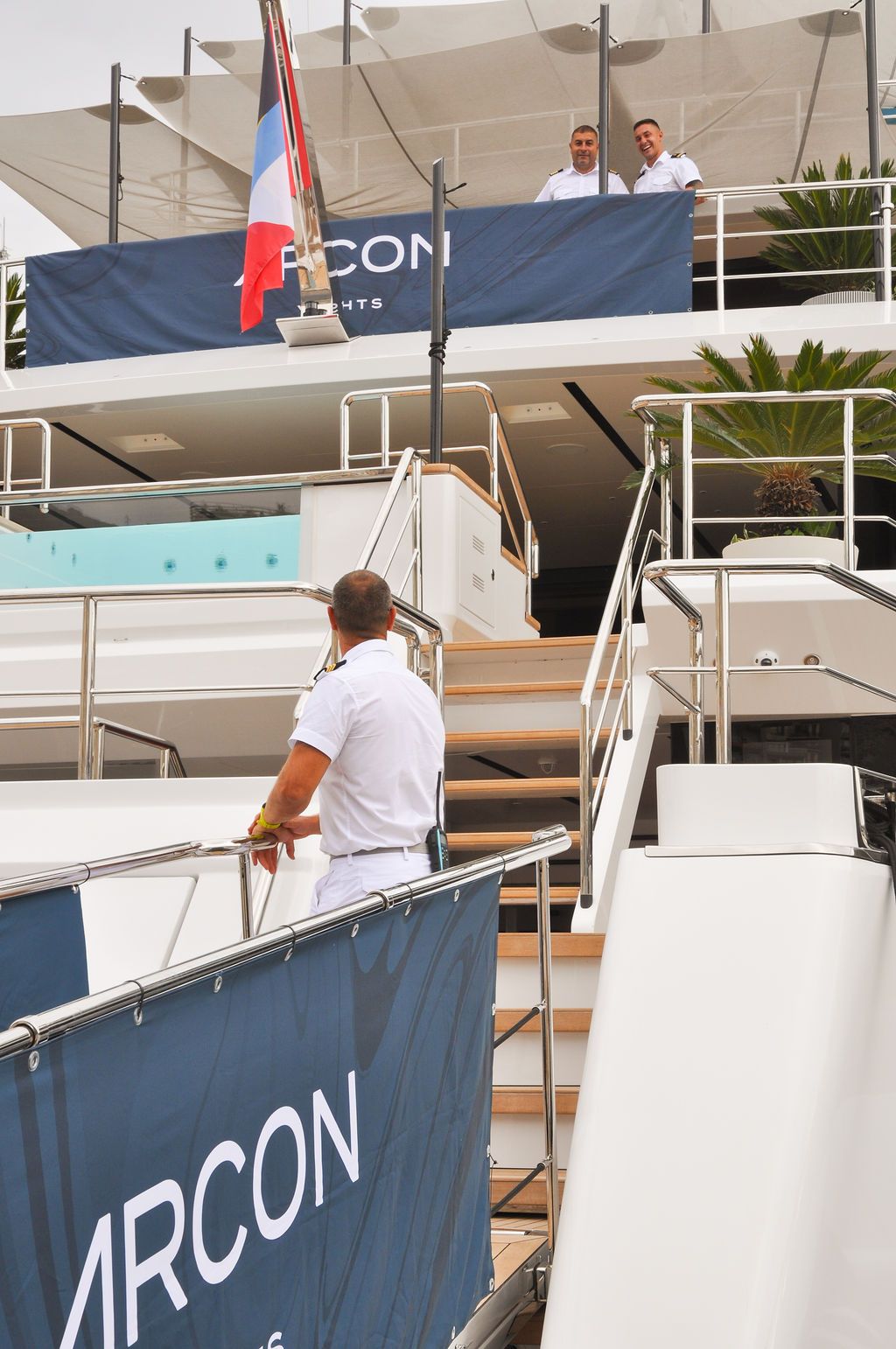 Yachts and crew on the docks at the 2026 Monaco Yacht Show in Port Hercule, Monaco.