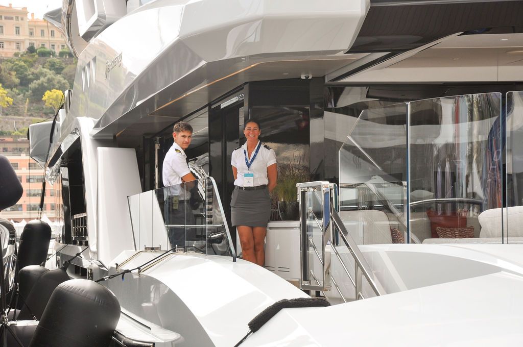 Yachts and crew on the docks at the 2026 Monaco Yacht Show in Port Hercule, Monaco.