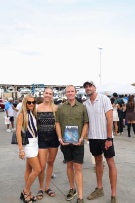 Guests networking at The Triton's Crew, Captains & Connections event at Nautical Ventures Marina.