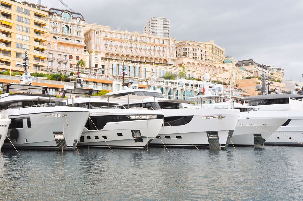 Yachts and crew on the docks at the 2026 Monaco Yacht Show in Port Hercule, Monaco.