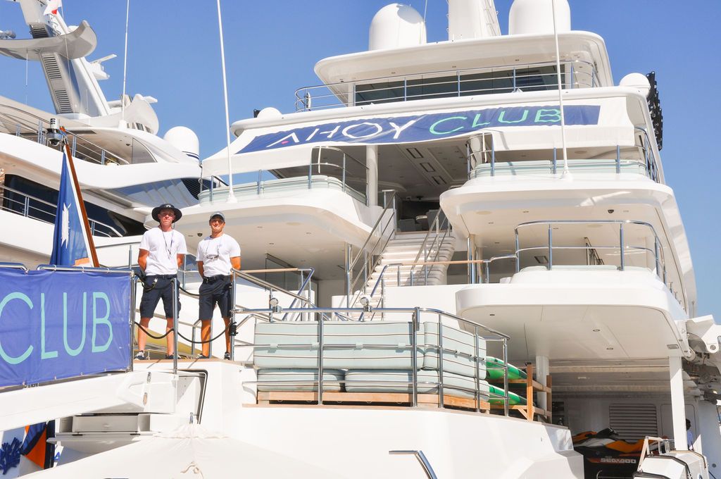 Yachts and crew on the docks at the 2026 Monaco Yacht Show in Port Hercule, Monaco.