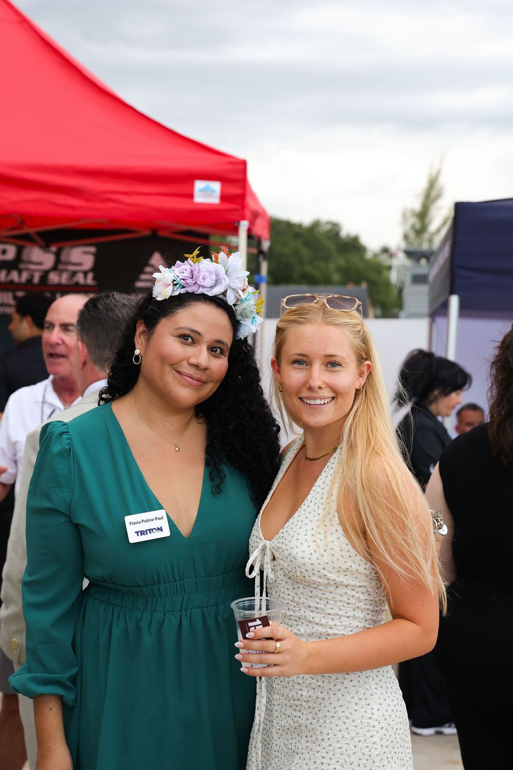 Guests networking at The Triton's Crew, Captains & Connections event at Nautical Ventures Marina.