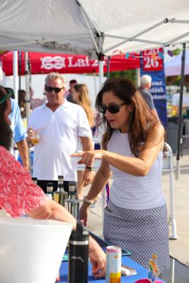 Guests networking at The Triton's Crew, Captains & Connections event at Nautical Ventures Marina.
