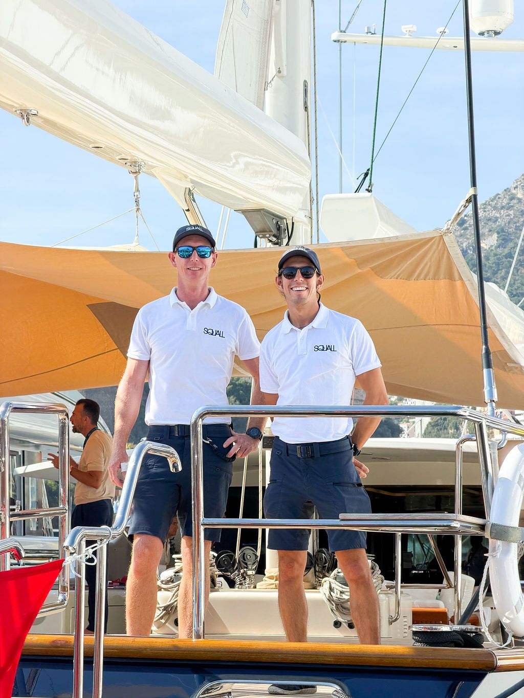 Yachts and crew on the docks at the 2026 Monaco Yacht Show in Port Hercule, Monaco.