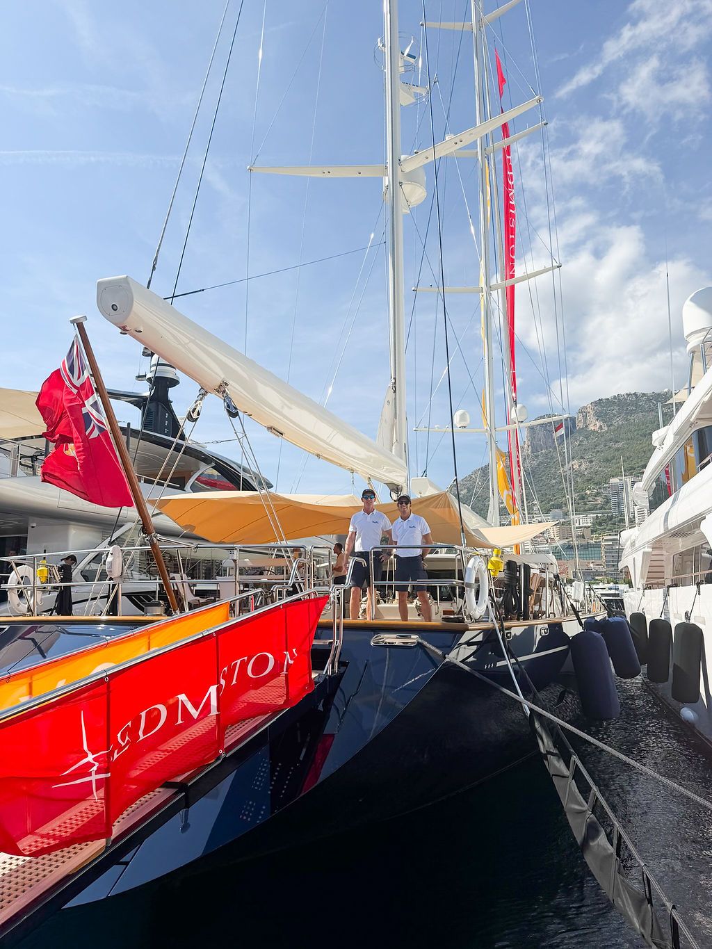 Yachts and crew on the docks at the 2026 Monaco Yacht Show in Port Hercule, Monaco.
