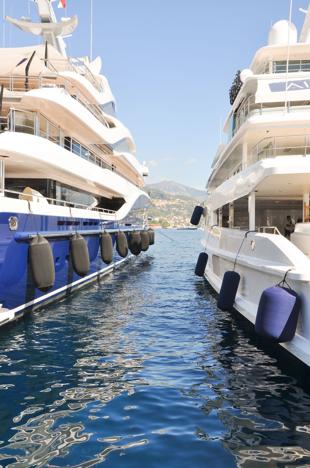 Yachts and crew on the docks at the 2026 Monaco Yacht Show in Port Hercule, Monaco.