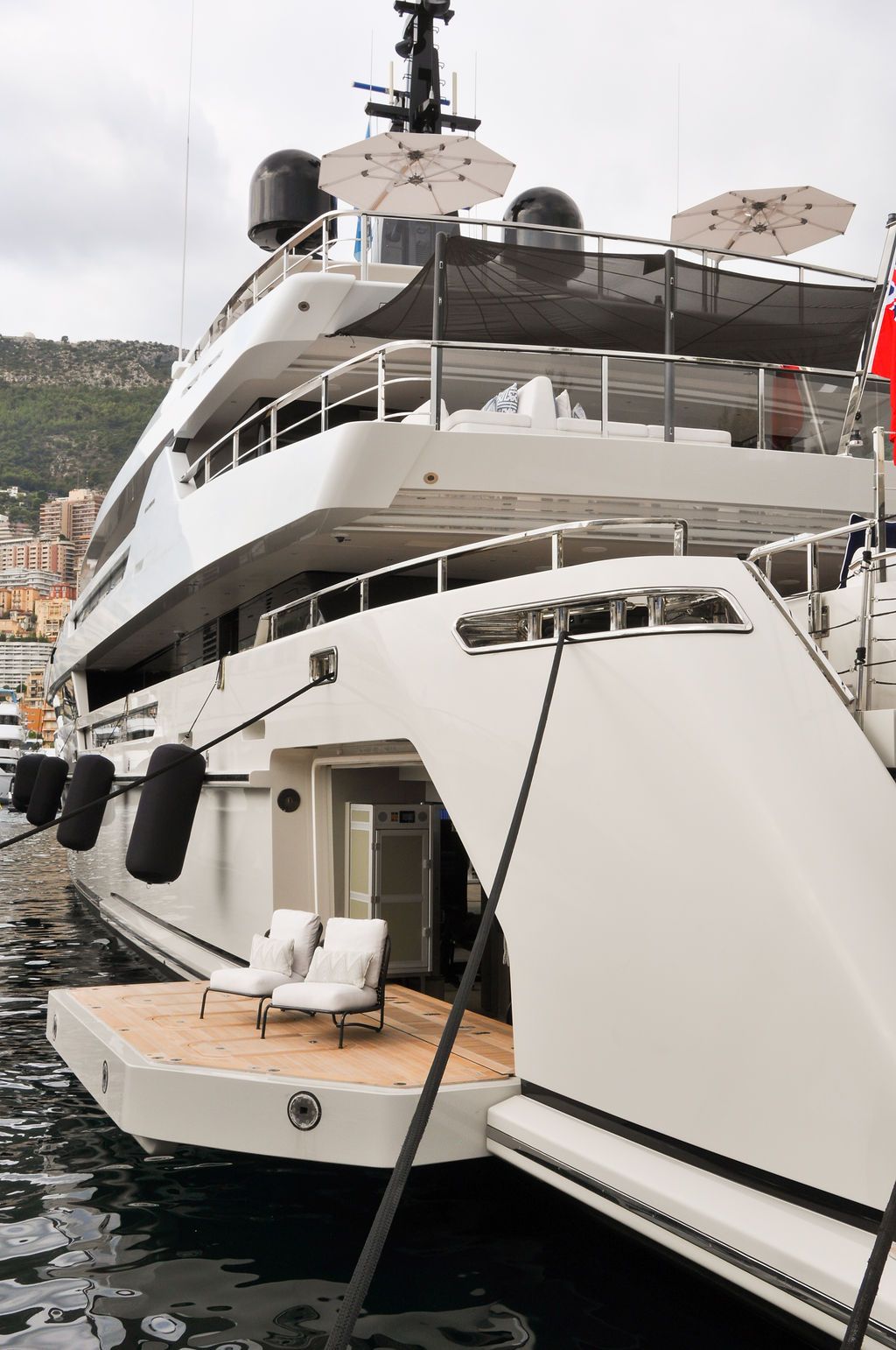 Yachts and crew on the docks at the 2026 Monaco Yacht Show in Port Hercule, Monaco.