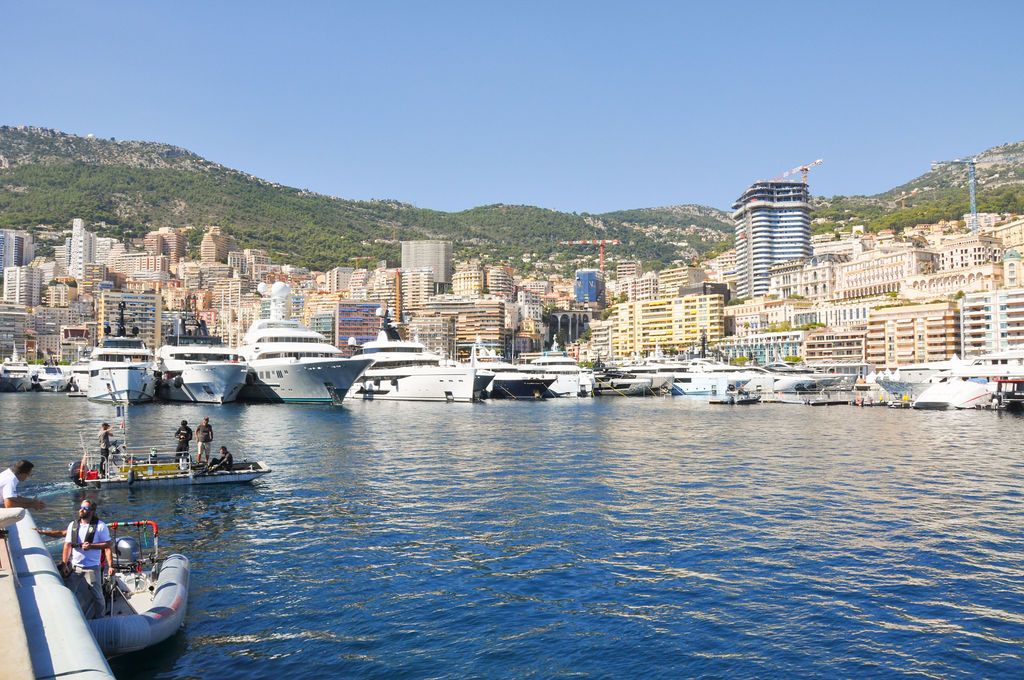 Yachts and crew on the docks at the 2026 Monaco Yacht Show in Port Hercule, Monaco.