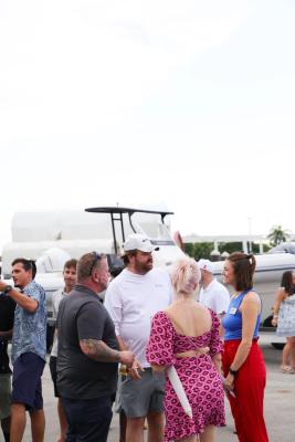 Guests networking at The Triton's Crew, Captains & Connections event at Nautical Ventures Marina.