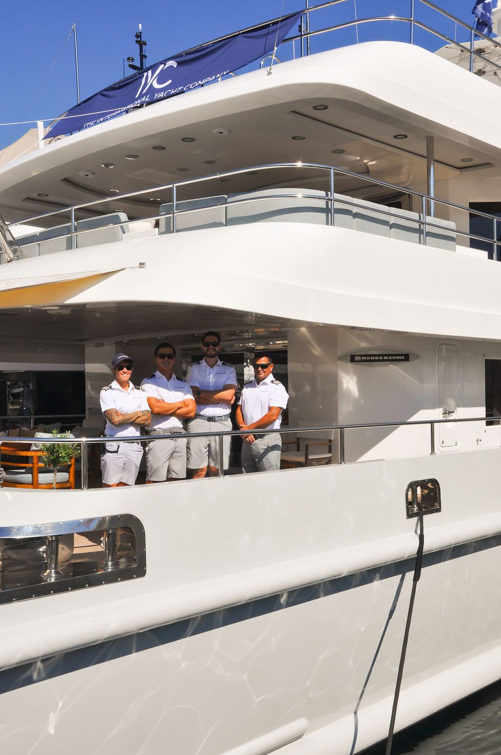 Yachts and crew on the docks at the 2026 Monaco Yacht Show in Port Hercule, Monaco.