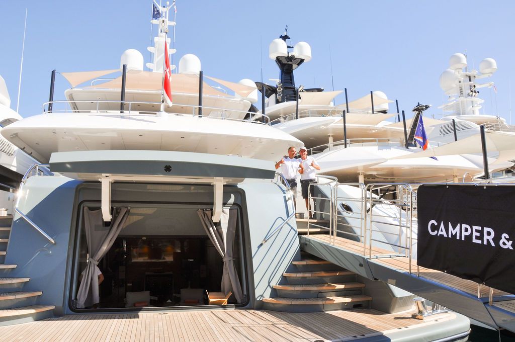 Yachts and crew on the docks at the 2026 Monaco Yacht Show in Port Hercule, Monaco.