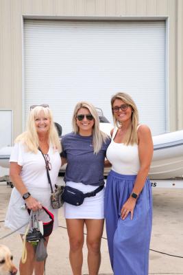 Guests networking at The Triton's Crew, Captains & Connections event at Nautical Ventures Marina.