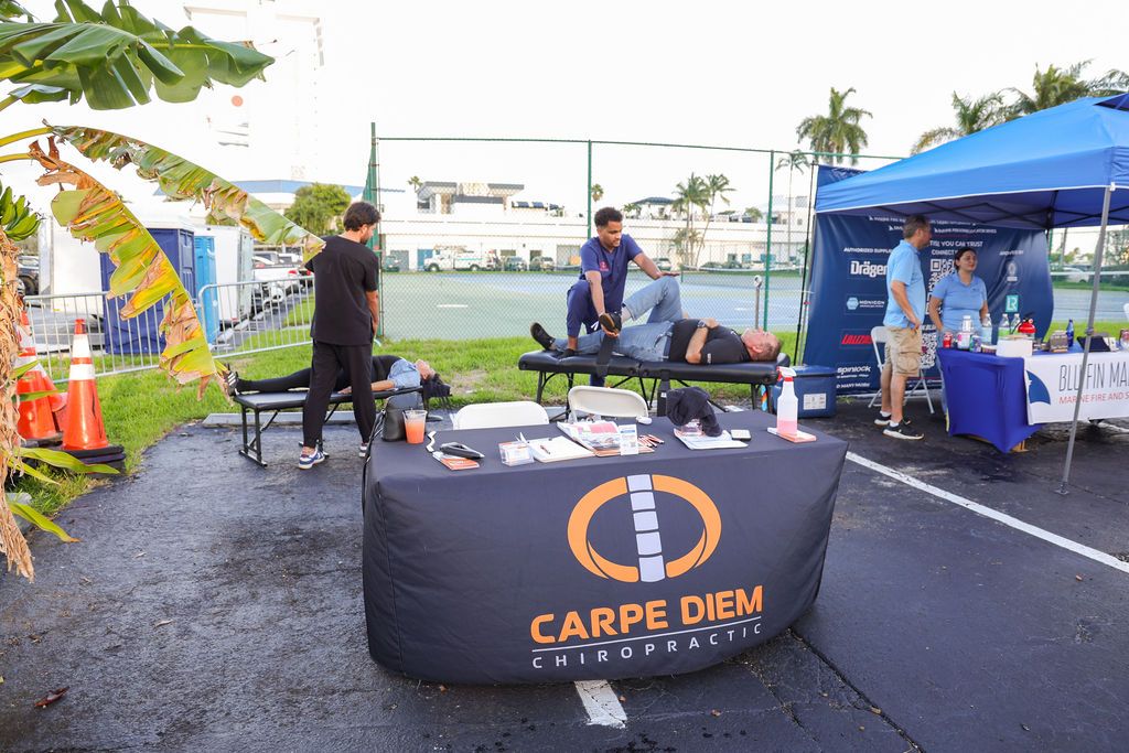 Guests and exhibitors at The Triton's Fall Triton Expo at Bahia Mar Yachting Center.
