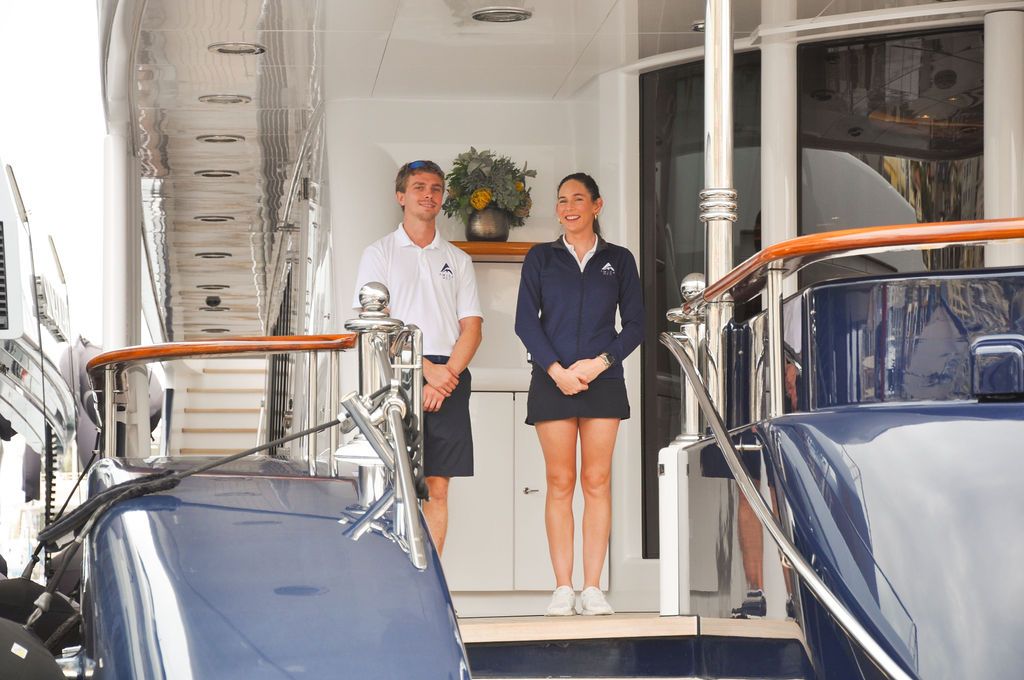 Yachts and crew on the docks at the 2026 Monaco Yacht Show in Port Hercule, Monaco.