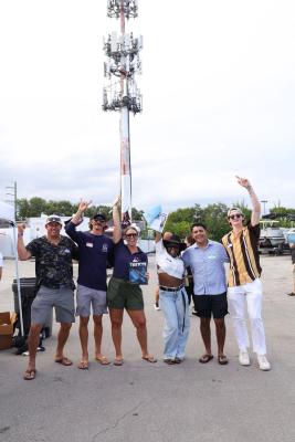 Guests networking at The Triton's Crew, Captains & Connections event at Nautical Ventures Marina.