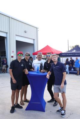 Guests networking at The Triton's Crew, Captains & Connections event at Nautical Ventures Marina.