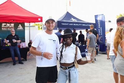 Guests networking at The Triton's Crew, Captains & Connections event at Nautical Ventures Marina.