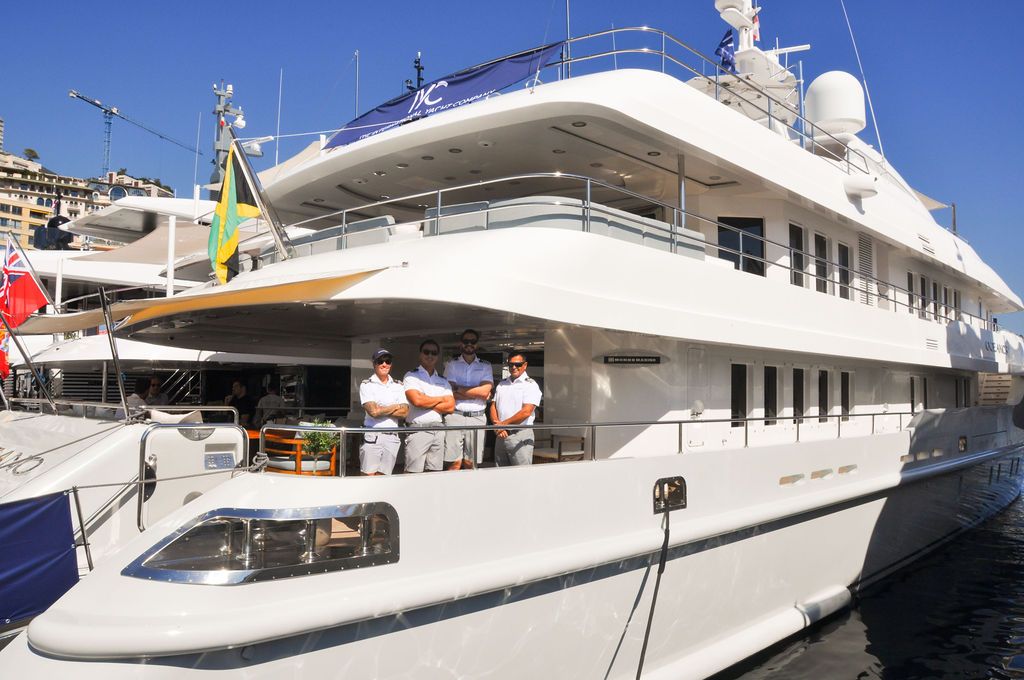Yachts and crew on the docks at the 2026 Monaco Yacht Show in Port Hercule, Monaco.