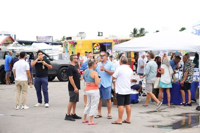 Guests networking at The Triton's Crew, Captains & Connections event at Nautical Ventures Marina.