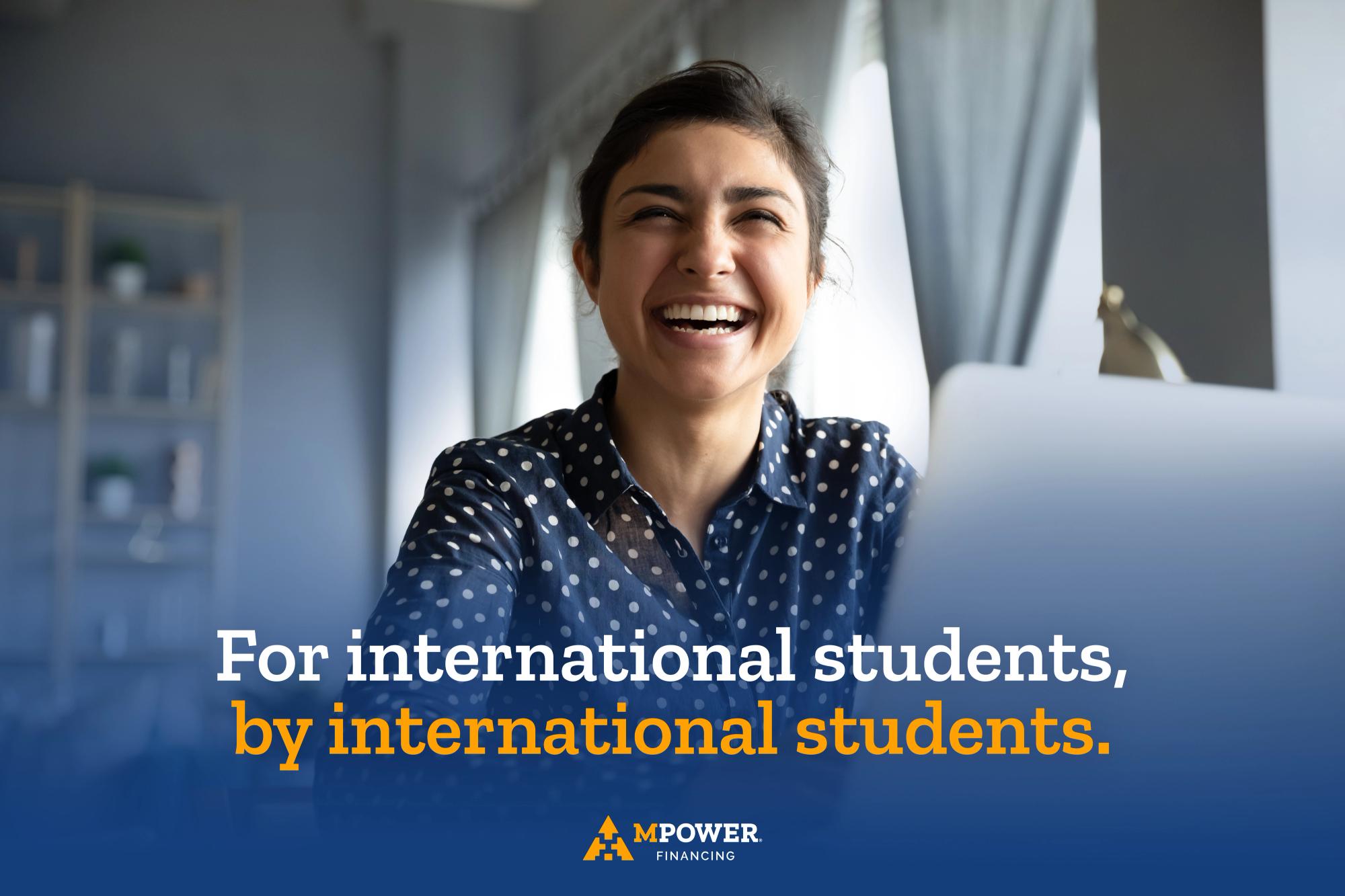 The new position as a key visual: a student laughing at her laptop, with “For international students, by international students” set across a navy wash beneath her.