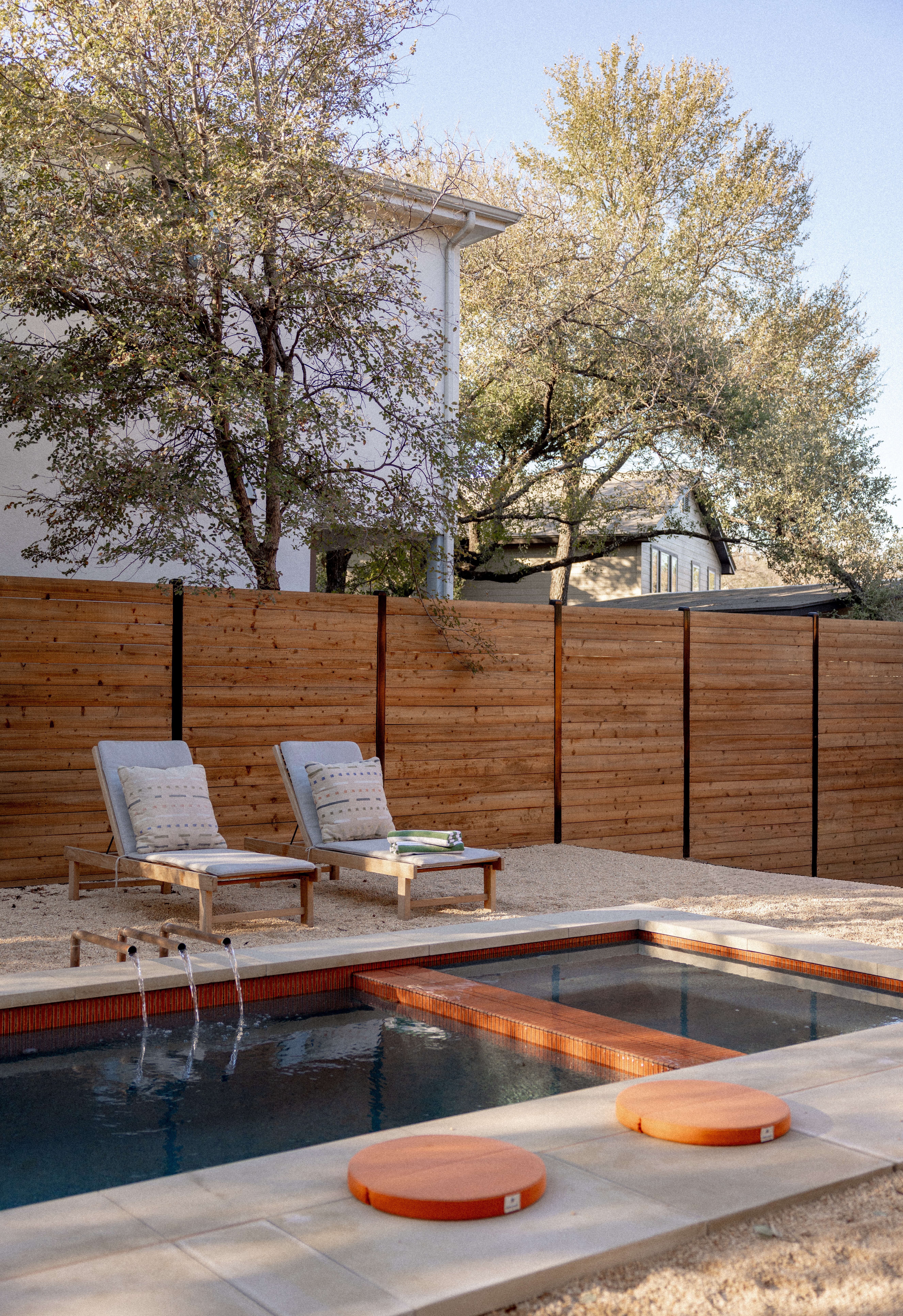 Golden Hour Pools Classic + Spa in Austin, featuring pool and spa with terracotta floats and gunite plaster finish