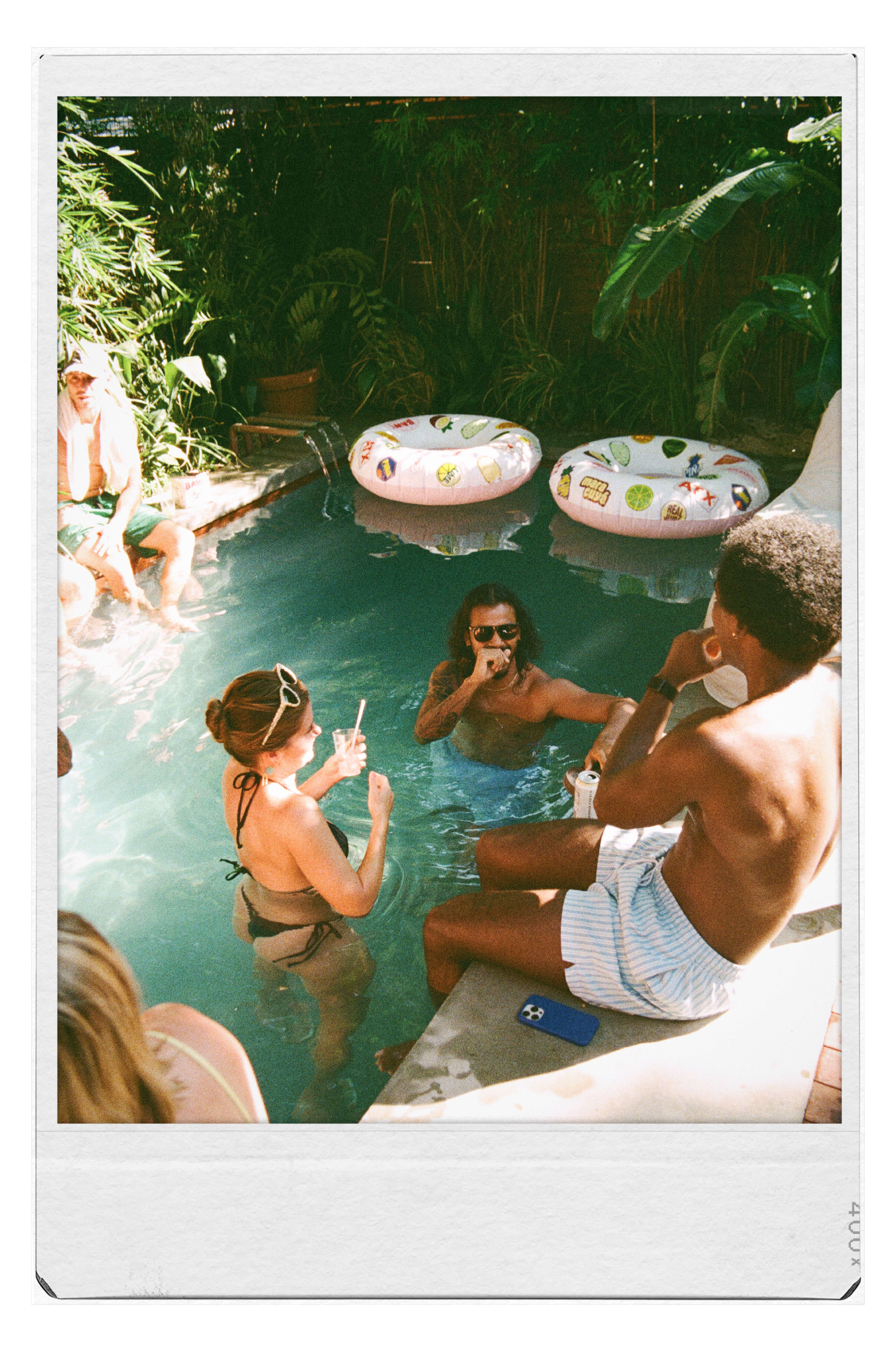 Friends enjoying a pool party in a Golden Hour Pools Classic pool in Austin, Texas