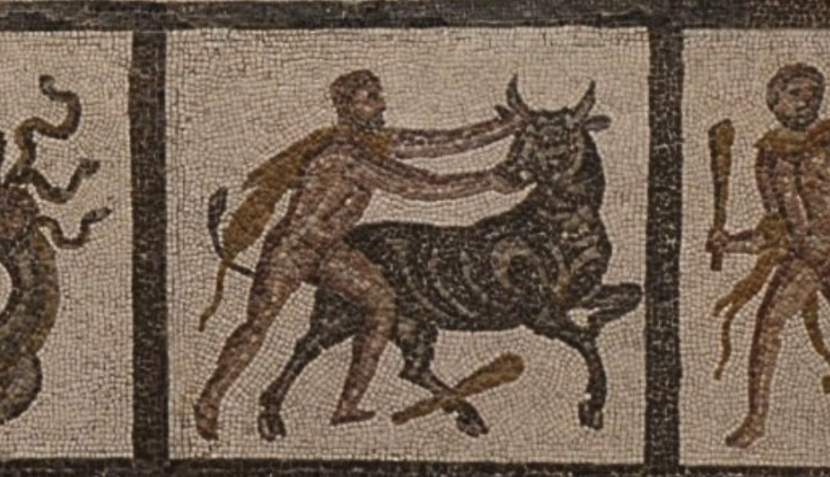 A detail from an ancient mosaic depicting a muscular hero wrestling a bull while another figure holds a club.