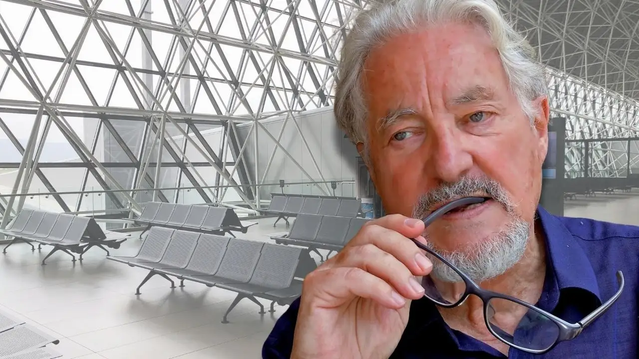 A composite image featuring a foreground portrait of an older man with a gray beard (anthropologist Marc Augé) thoughtfully holding the earpiece of his glasses in his mouth. He is superimposed over a background of a sterile, empty modern airport terminal with rows of metallic seating and large, geometric glass windows.