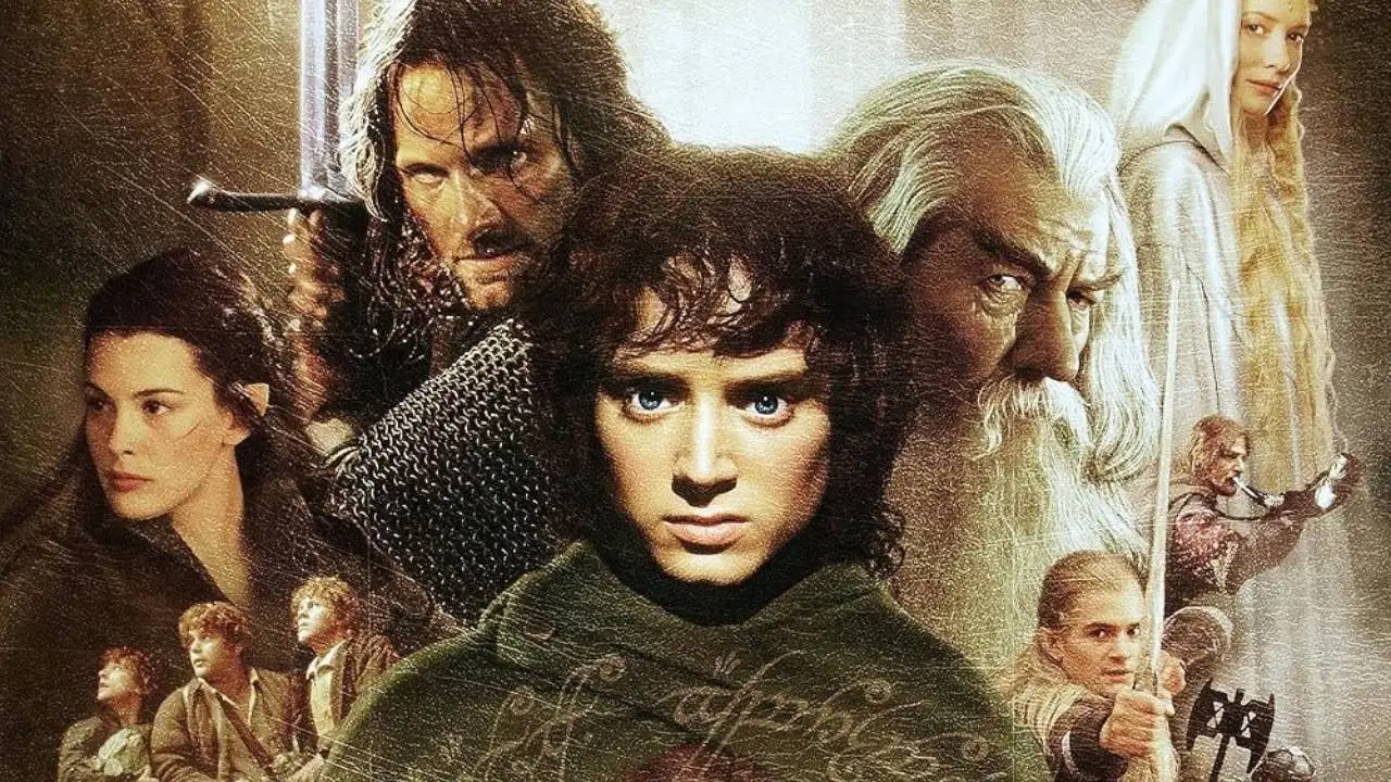 A cinematic montage of The Lord of the Rings characters, featuring Frodo Baggins in the center looking forward, surrounded by Aragorn wielding a sword, Gandalf the White, Galadriel, Arwen, Sam, Pippin, and Legolas.