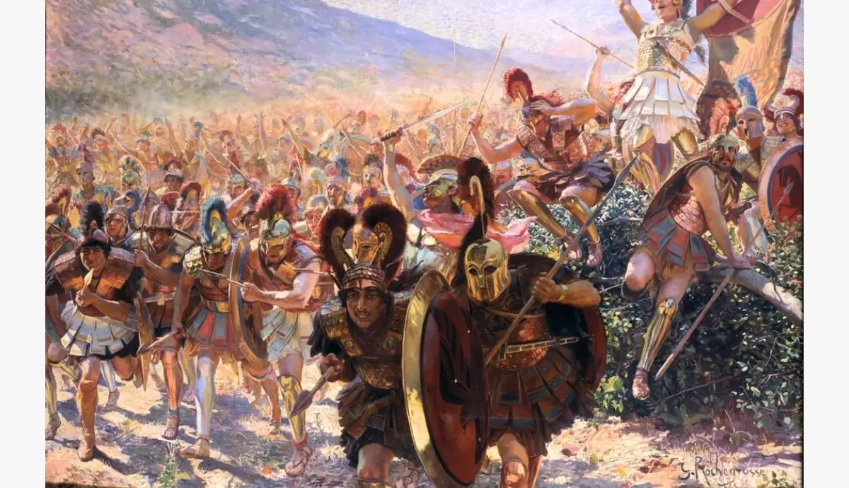 A vibrant, dramatic classical painting by Georges Rochegrosse depicting Greek hoplites charging forward into battle with spears and polished bronze shields.
