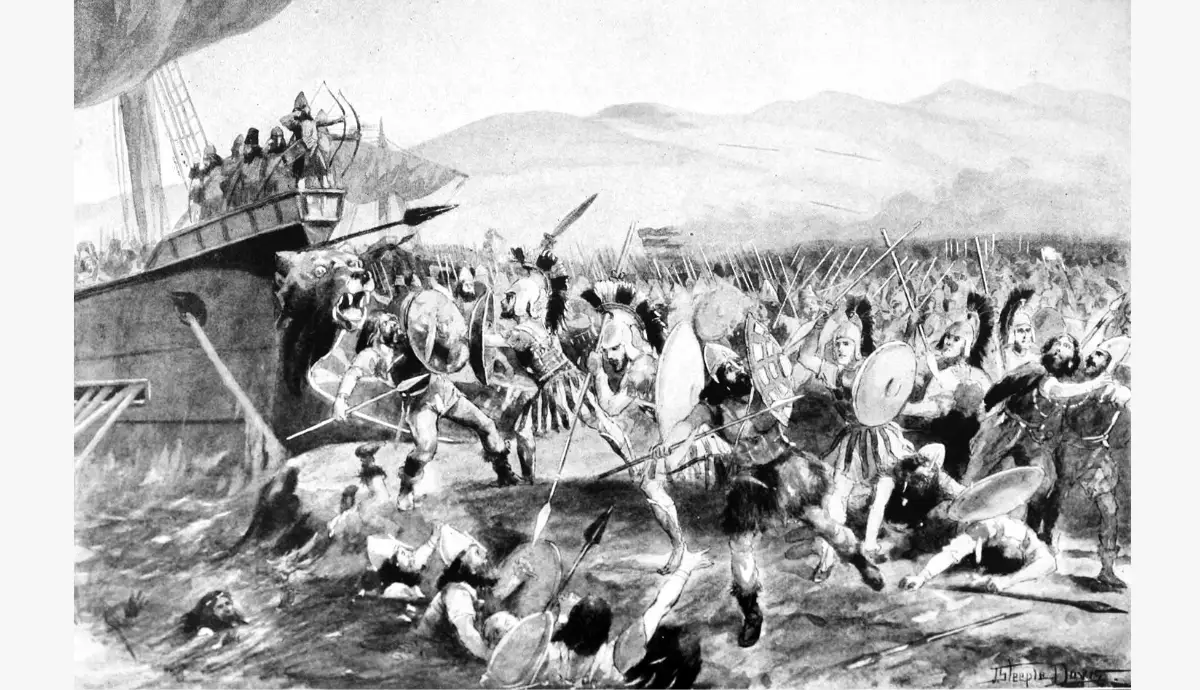 A dramatic black-and-white illustration depicting heavily armed Greek hoplites fiercely fighting Persian soldiers on a beach alongside ancient warships.