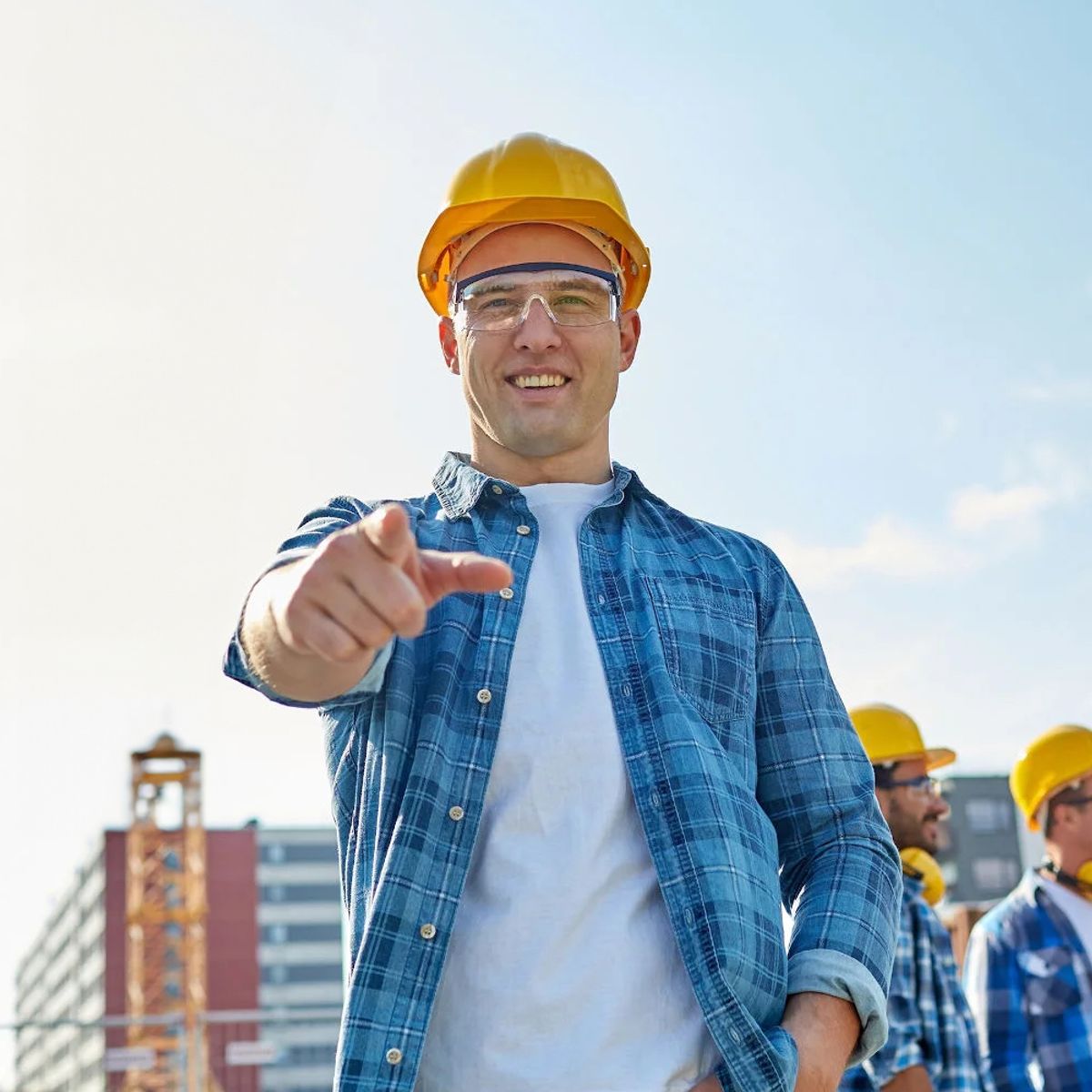 Roofer pointing to camera