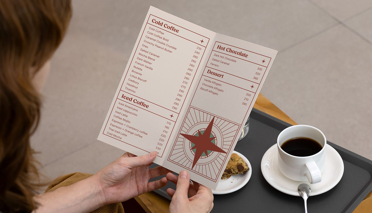 Customer reading a menu