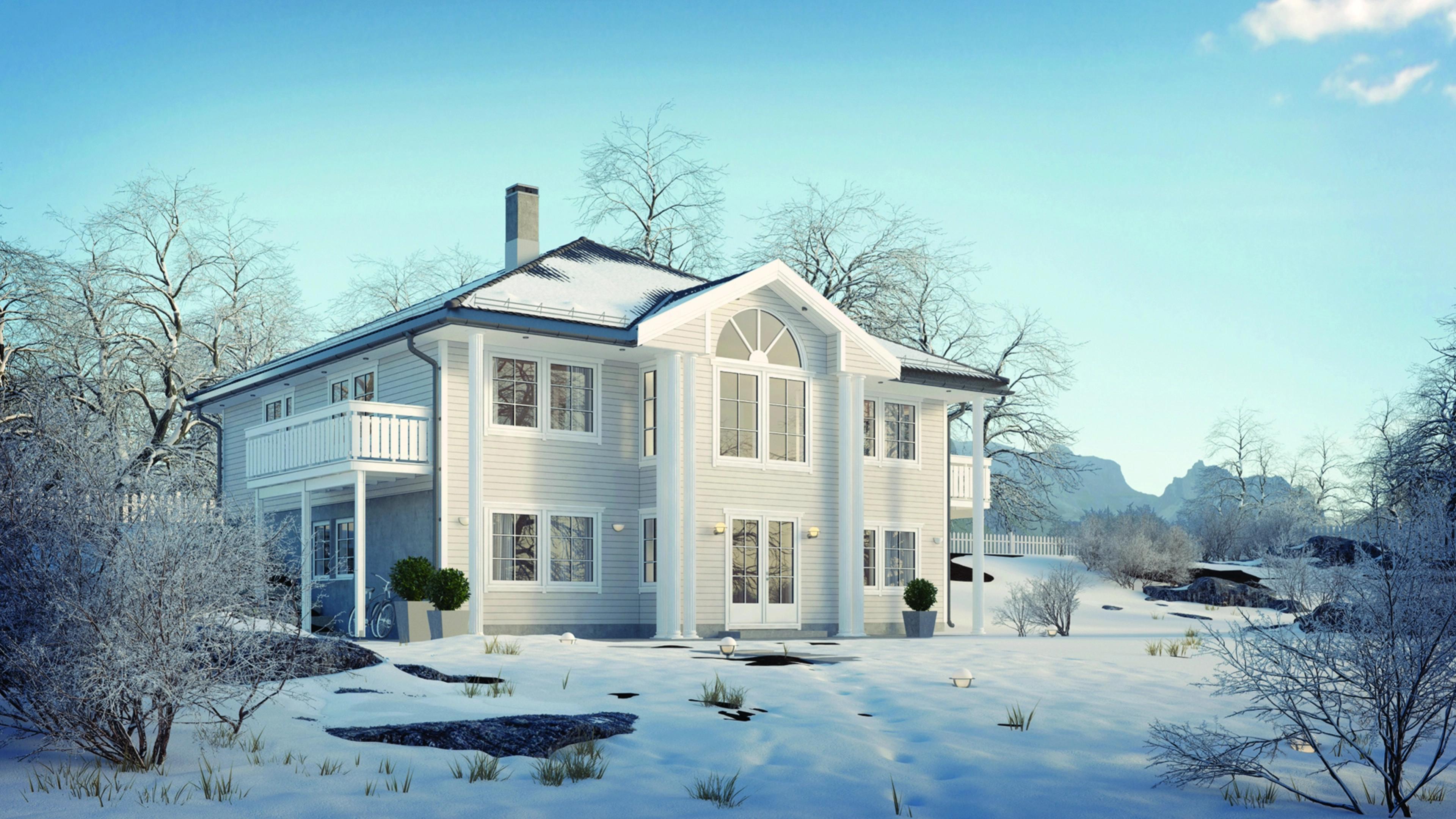 Stort herskapelig hus i vinterdrakt stor hage med snø