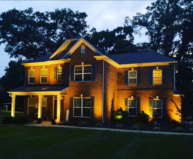 Brick Home Symmetrical Uplighting