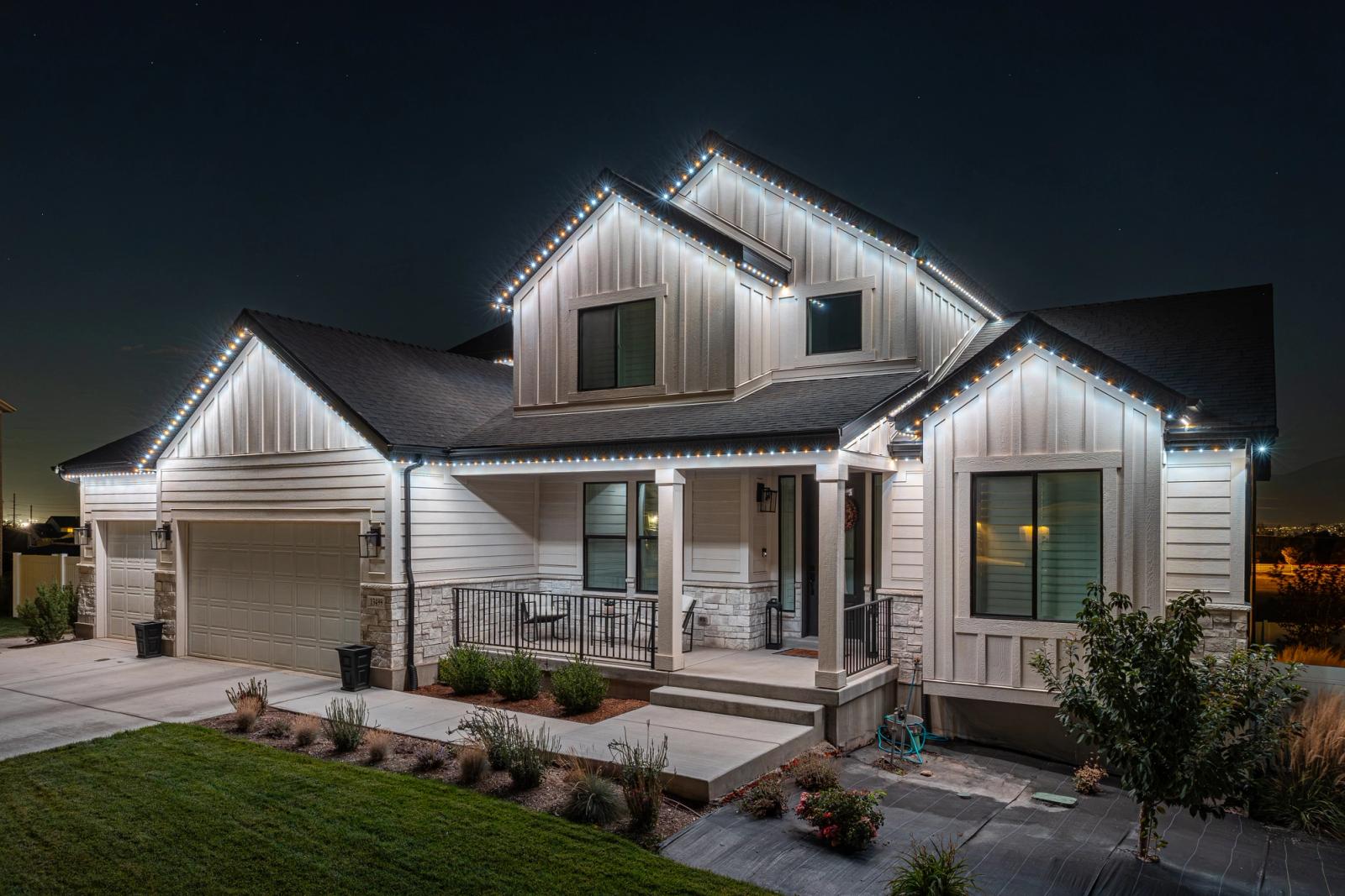 Same home at night with permanent LED trim lighting turned on
