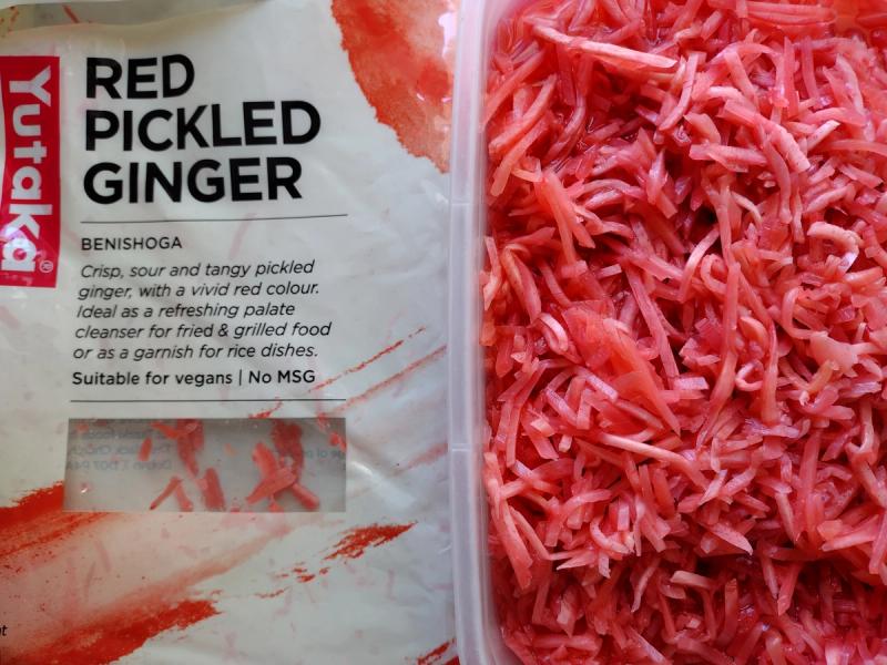 A plate full of Yutaka's red pickled giner, benishoga.