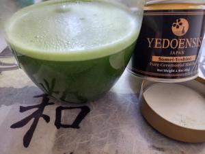 The YEDOENSIS matcha after being whisked, producing a vibrant green and froth usucha.