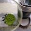 A photo of ROKUCHA's ceremonial matcha's fresh powder, showing high quality alongside the official tin.