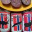 A comparison of three traditional Norwegian cured meats from Svindland Spekemat. Packages and slices of reindeer, minke whale, and moose sausage are displayed