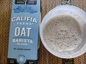 The texture and appearance of a Jimmy Joy shake when mixed with a no-sugar-added oat barista blend for a comparative review.