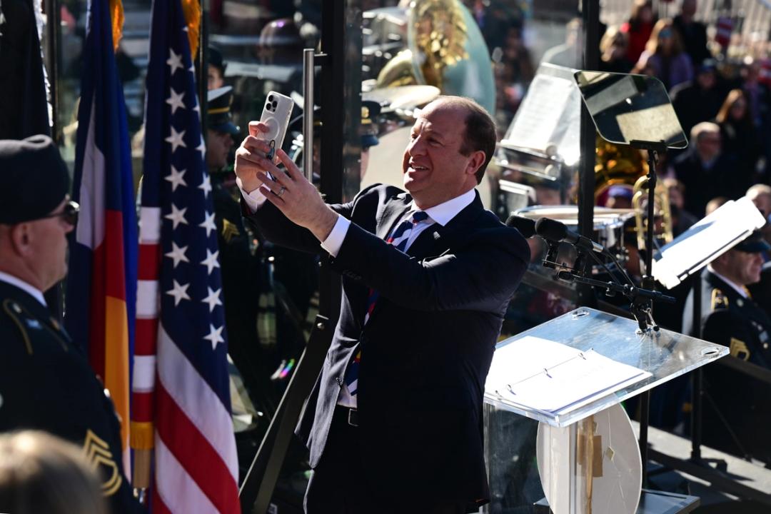  Gov. Jared Polis takes a selfie.