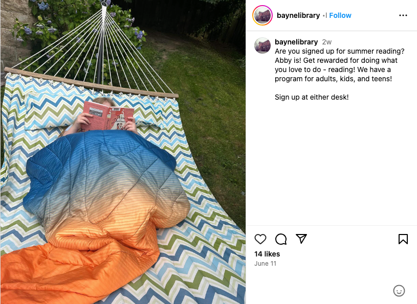 Instagram screenshot of a person reading a book on a hammock.