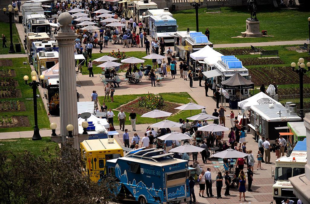 Hundreds of Denverites peruse dozens of local food truck options at Civic Center EATS.