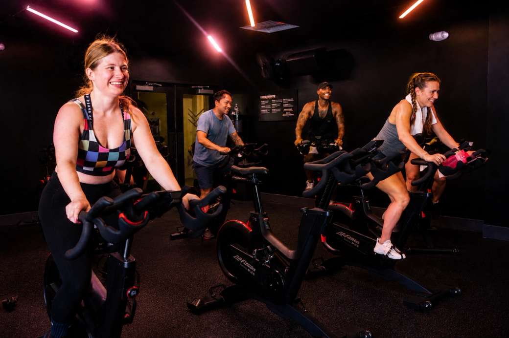 Women lifting weights in a workout class